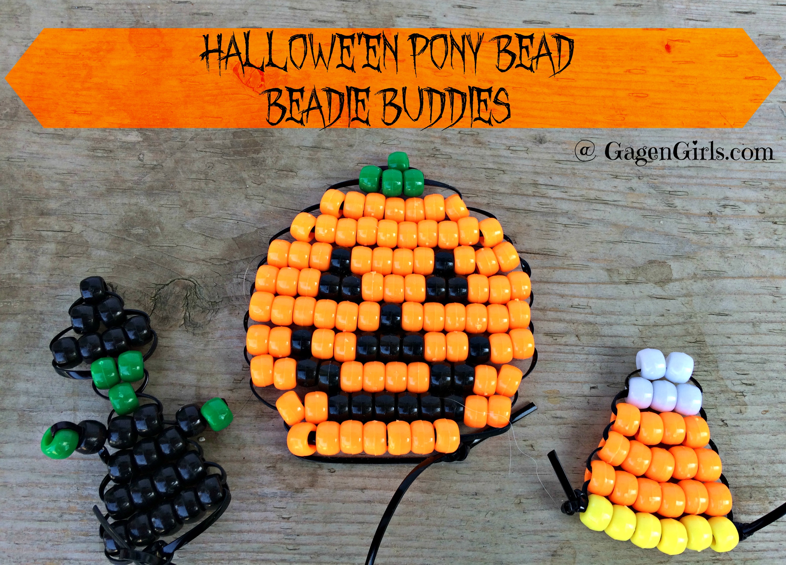 Halloween pony bead beadie buddies - a jack-o'-lantern, a candy corn, and a witch.