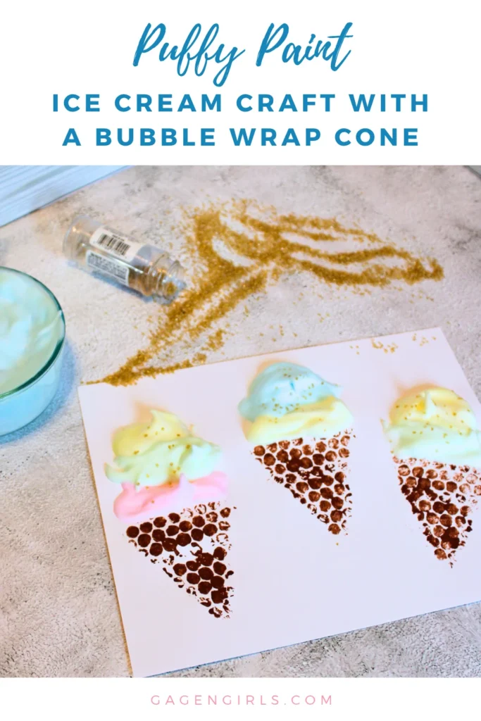 Puffy paint ice cream cone craft with gold glitter sprinkles and a spilled container of glitter.