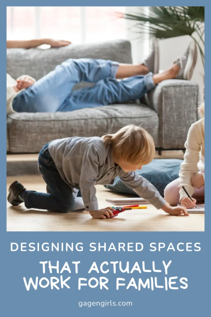 A cozy family living room where young children play on the floor and a parent lounges on the sofa, representing functional shared spaces for families.