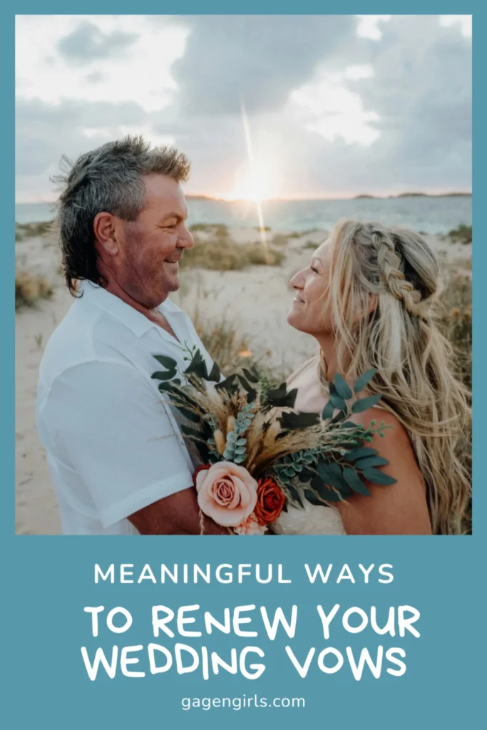 couple embracing on beach at sunset during vow renewal
