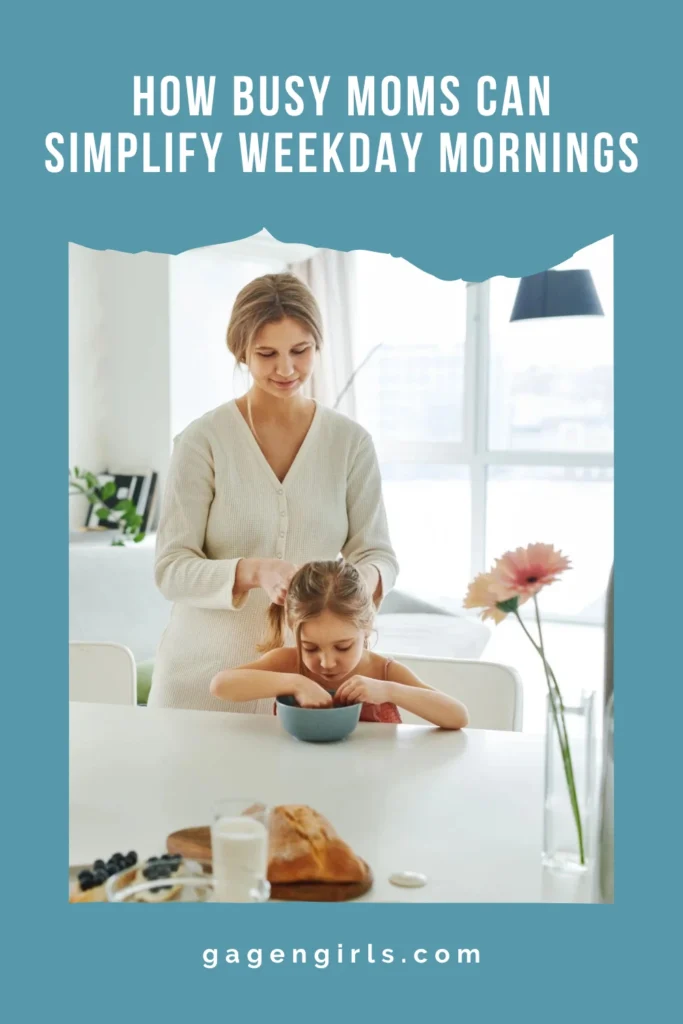 Mother braiding her daughter's hair before breakfast as part of a peaceful weekday morning routine.