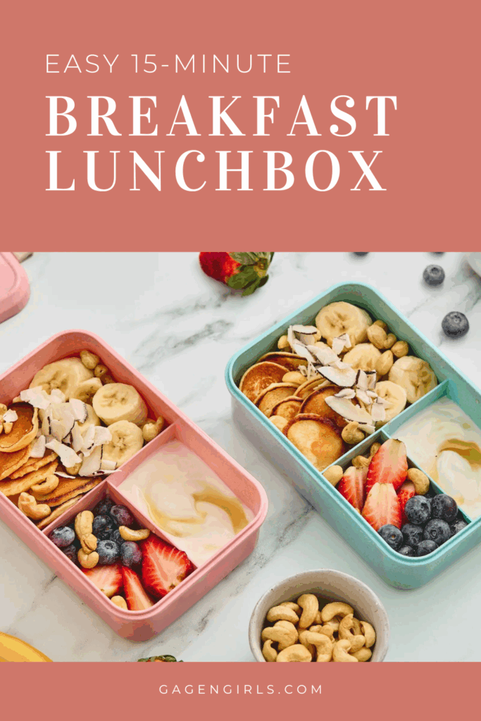 Overhead view of two mini pancake breakfast lunchboxes with yogurt, fresh fruit, cashews, and coconut.