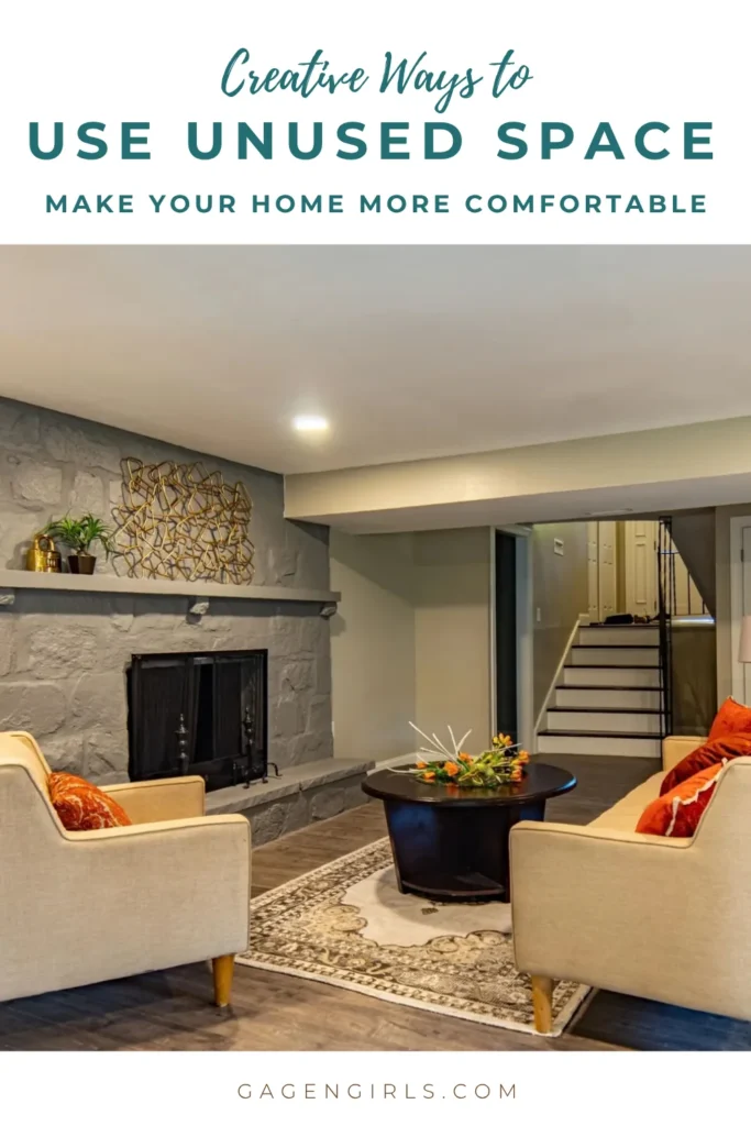 Pinterest graphic featuring a cozy finished basement with a stone fireplace and seating, promoting creative ways to use unused space in your home.